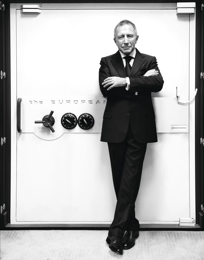 Laurence graff stands in front of a safe