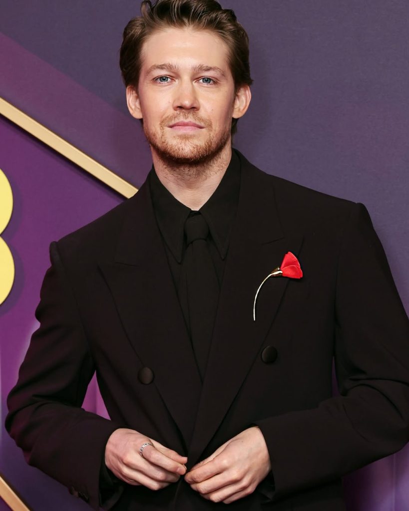 Joe Alwyn in Elsa Peretti’s Amapola brooch for Tiffany & Co.