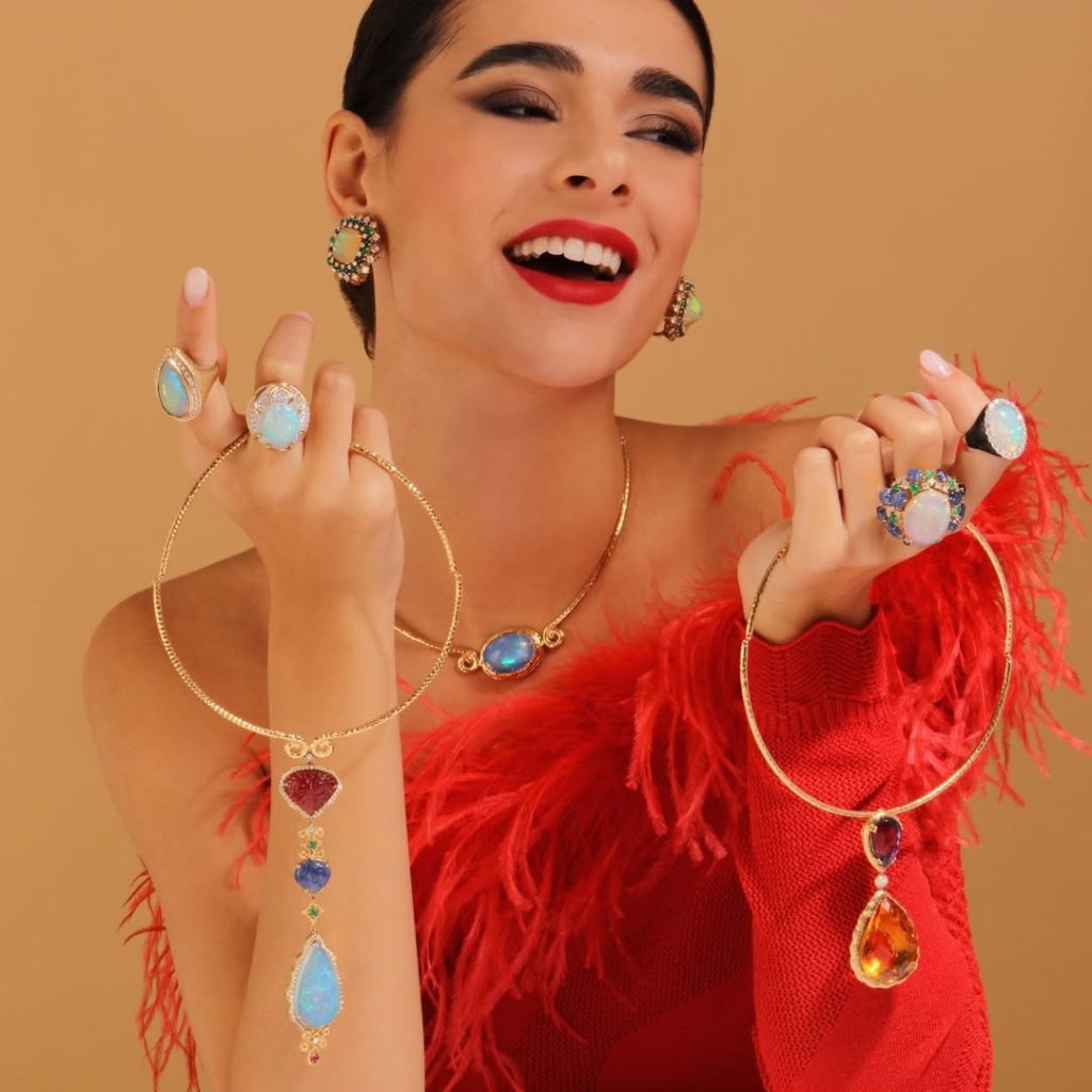 woman wearing opal jewelry set