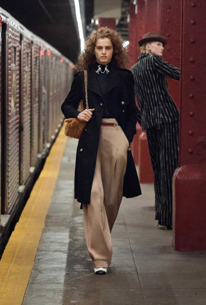woman wearing chanel dalmatian dog brooches