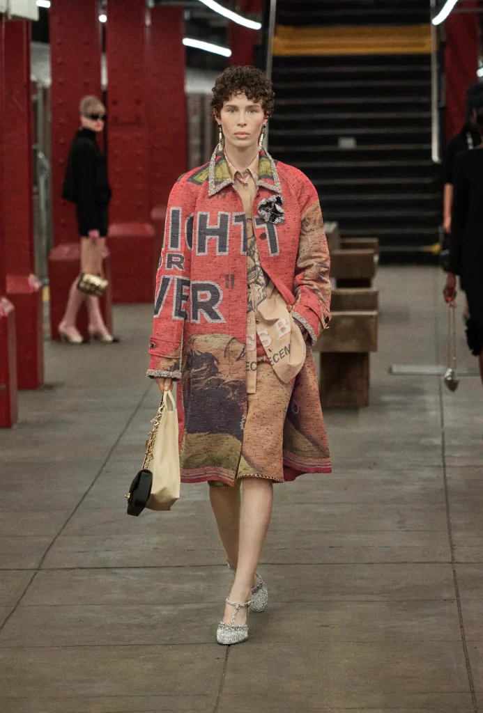 woman wearing chanel floral brooch