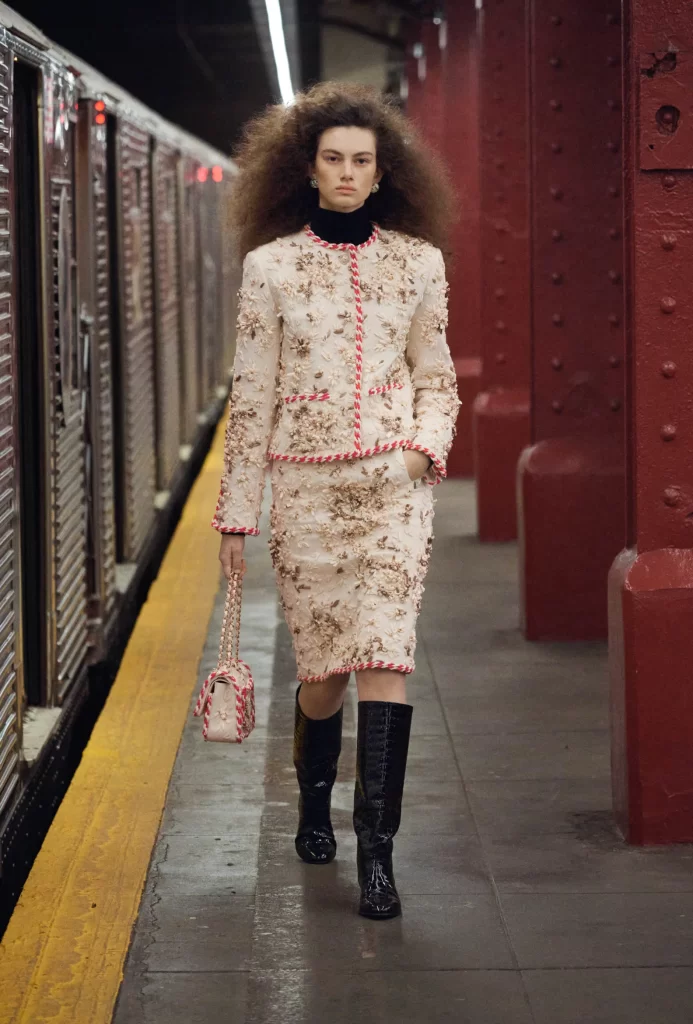 model wearing the popcorn flap bat at chanel métiers d'art 2026 show