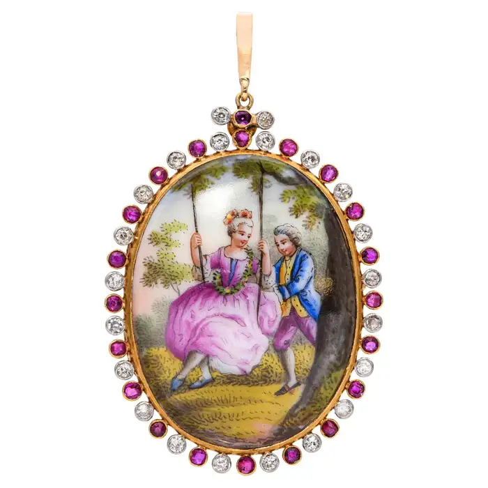 gold and ruby locket with painting of a couple