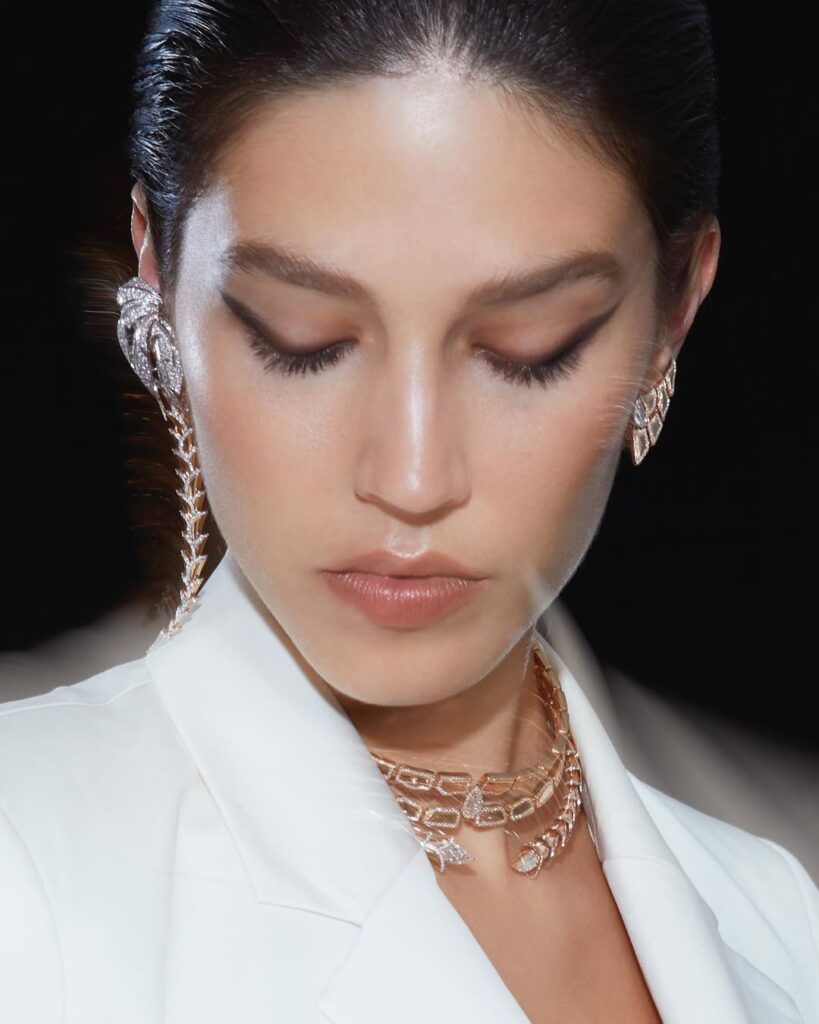 woman wearing diamond jewelry