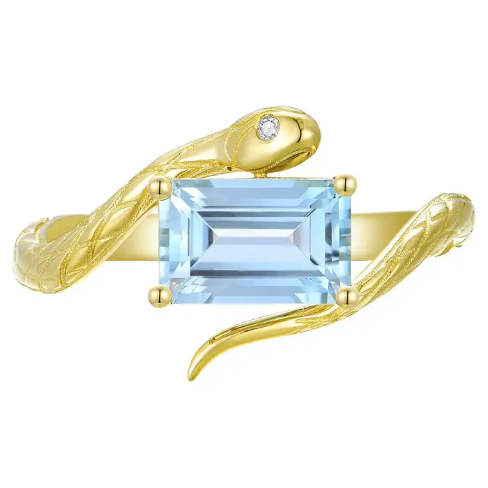 aquamarine and diamond east west rings with snake detail