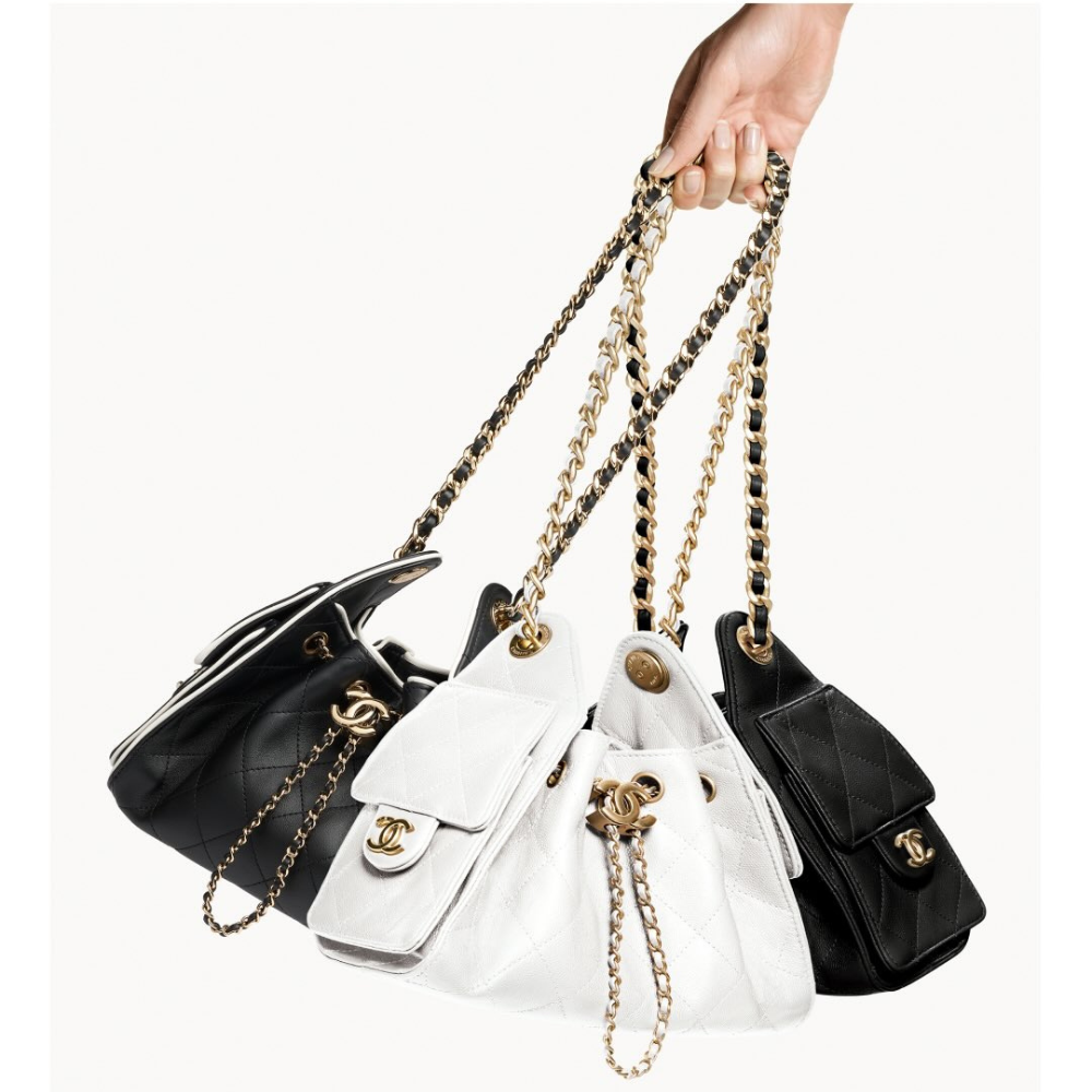 chanel 25 handbag in white and black investment