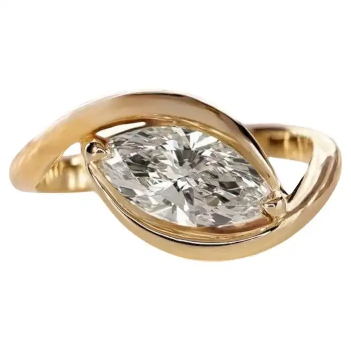 yellow gold and marquise diamond ring