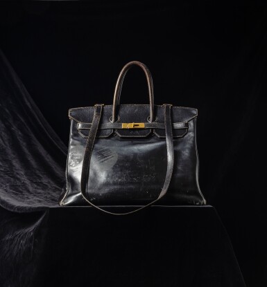 is handbags an investment the original jane birkin bag against a black background