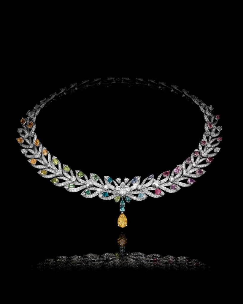 victory high jewelry necklace with colored diamonds