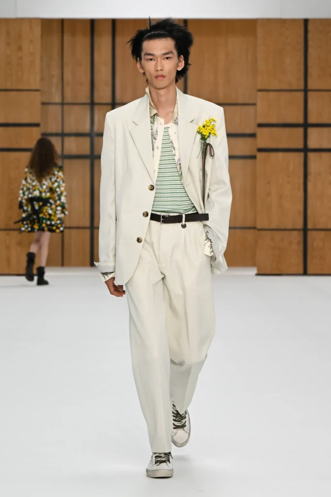 man wearing suit and fabric brooch lfw spring 2027 jewelry trends