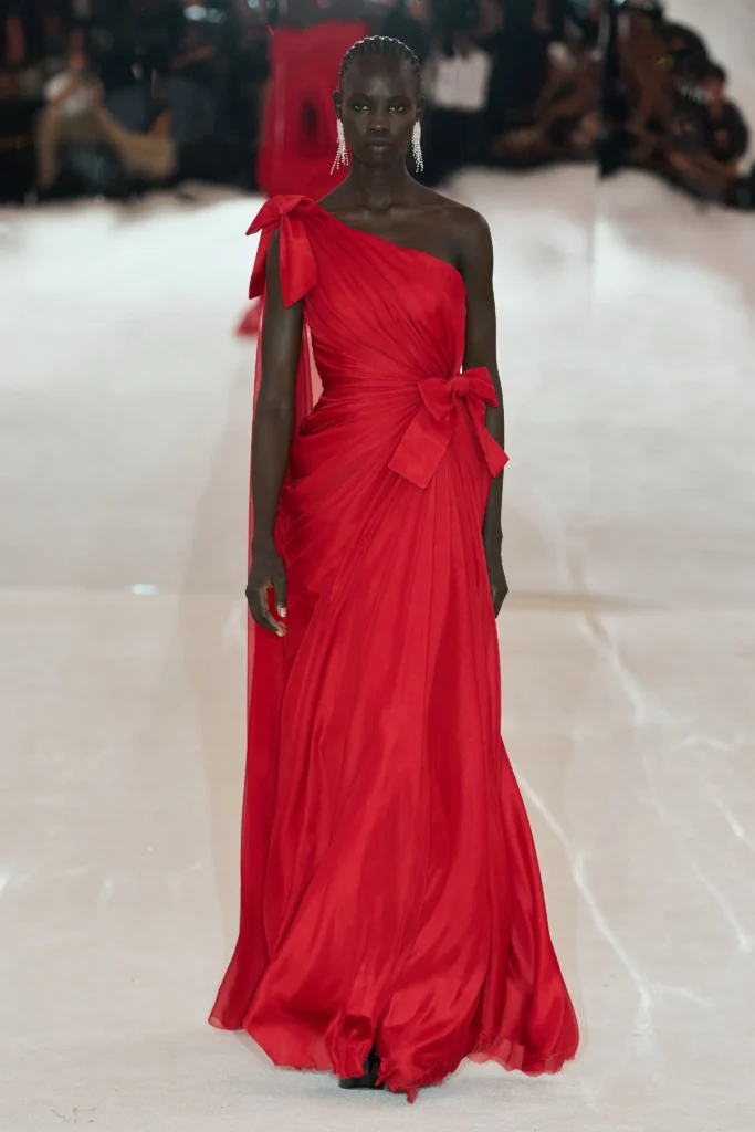 model wears chandelier earrings jewelry on richard quinn lfw spring 2027 runway trends